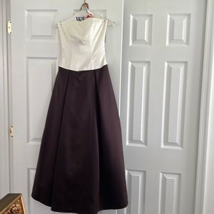 Strapless gown. Bottom is chocolate brown. Top is ivory.